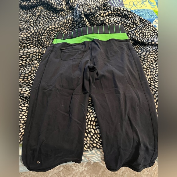 Lululemon Capri athletic pants. Navy blue with green trim. Size 10 without tags. - Picture 6 of 6